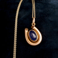 Edwardian Sapphire Cabochon Horseshoe Pendant