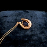 Edwardian Sapphire Cabochon Horseshoe Pendant